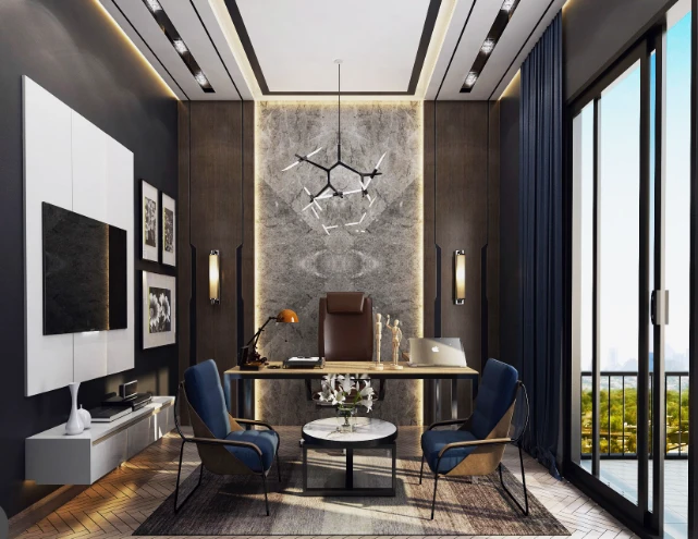 A high-end home office featuring a marble accent wall, geometric chandelier, and blue armchairs.